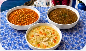 Fasolada on the left, lentil soup on the right, and avgolemono in front